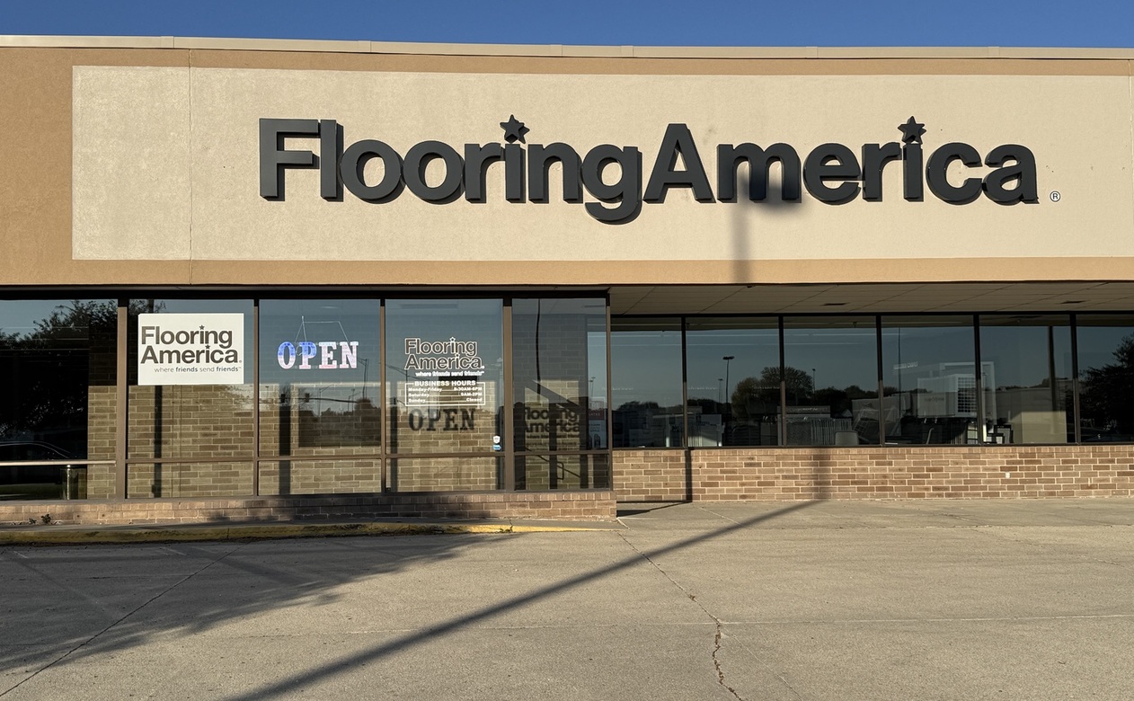Exterior of Flooring America-Spencer in Spencer, Iowa, showing the storefront, Flooring America signage, and main entrance.